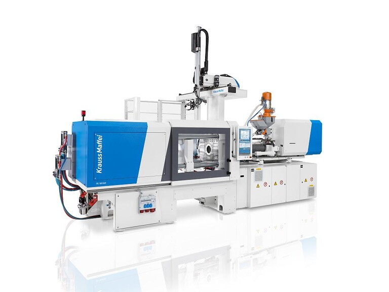 Spitzenzykluszeiten für die Verpackungsindustrie: Auf einer PX 160-540 mit Linearroboter LRX werden Flip-Top-Verschlüsse produziert. (Foto: Krauss Maffei)