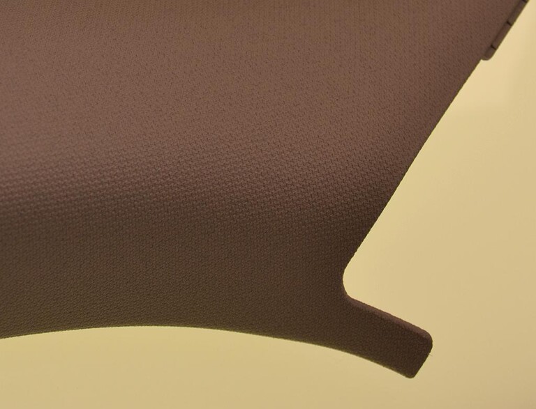 Das Masterbatch Smartbatch Fabric FX verleiht Kunststoffteilen eine Textiloptik. (Foto: K-AKTUELL)